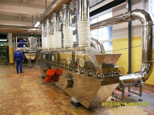 τελευταία εταιρεία περί Εφαρμογή δονητικού υγροποιημένου στεγνωτήρα κρεβατιού για συνεχή ξήρανση κόκκων στην Αυστρία